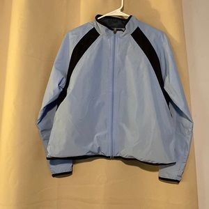 Women’s size medium windbreaker.